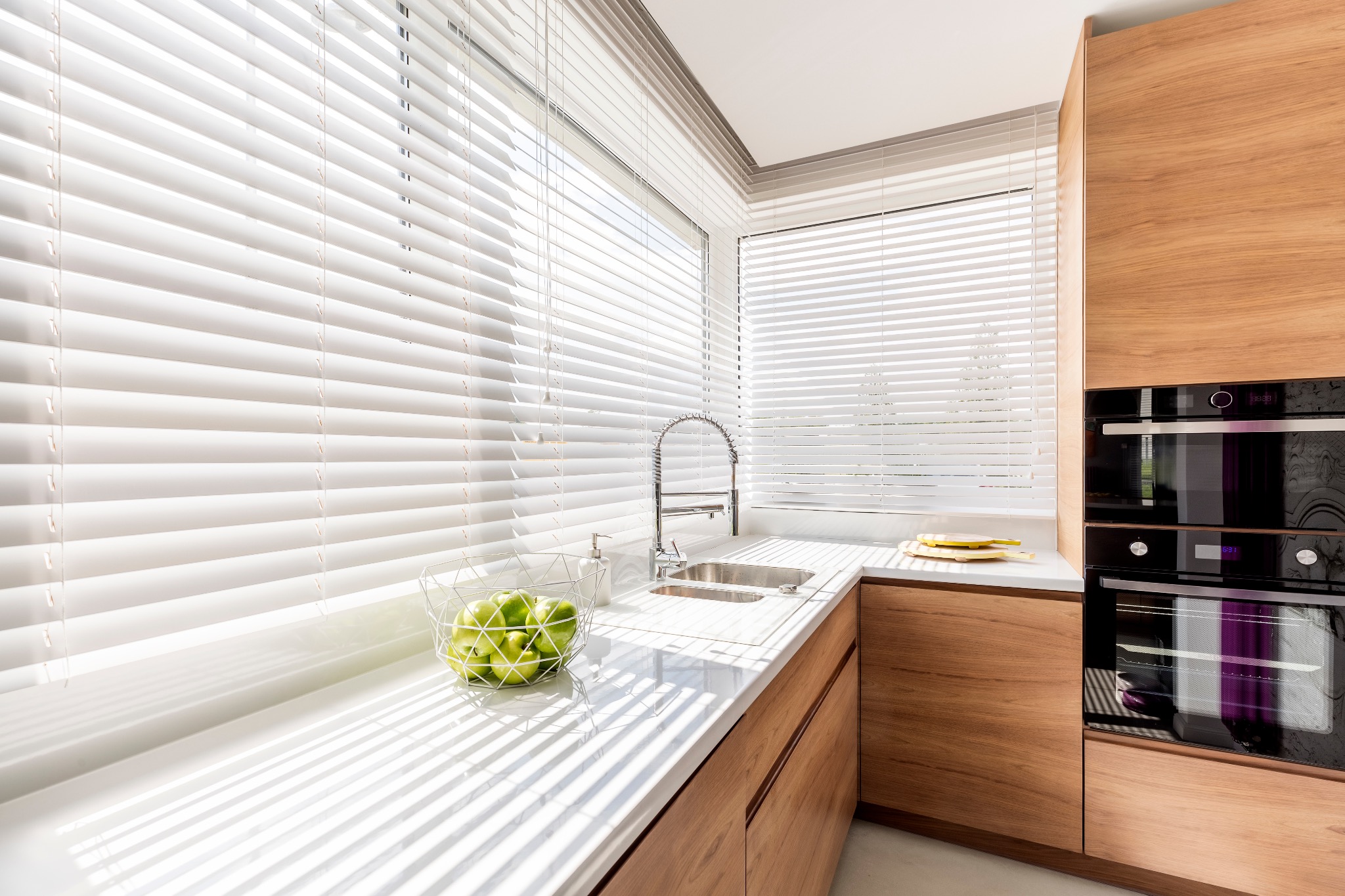 White blinds in a bright kitchen