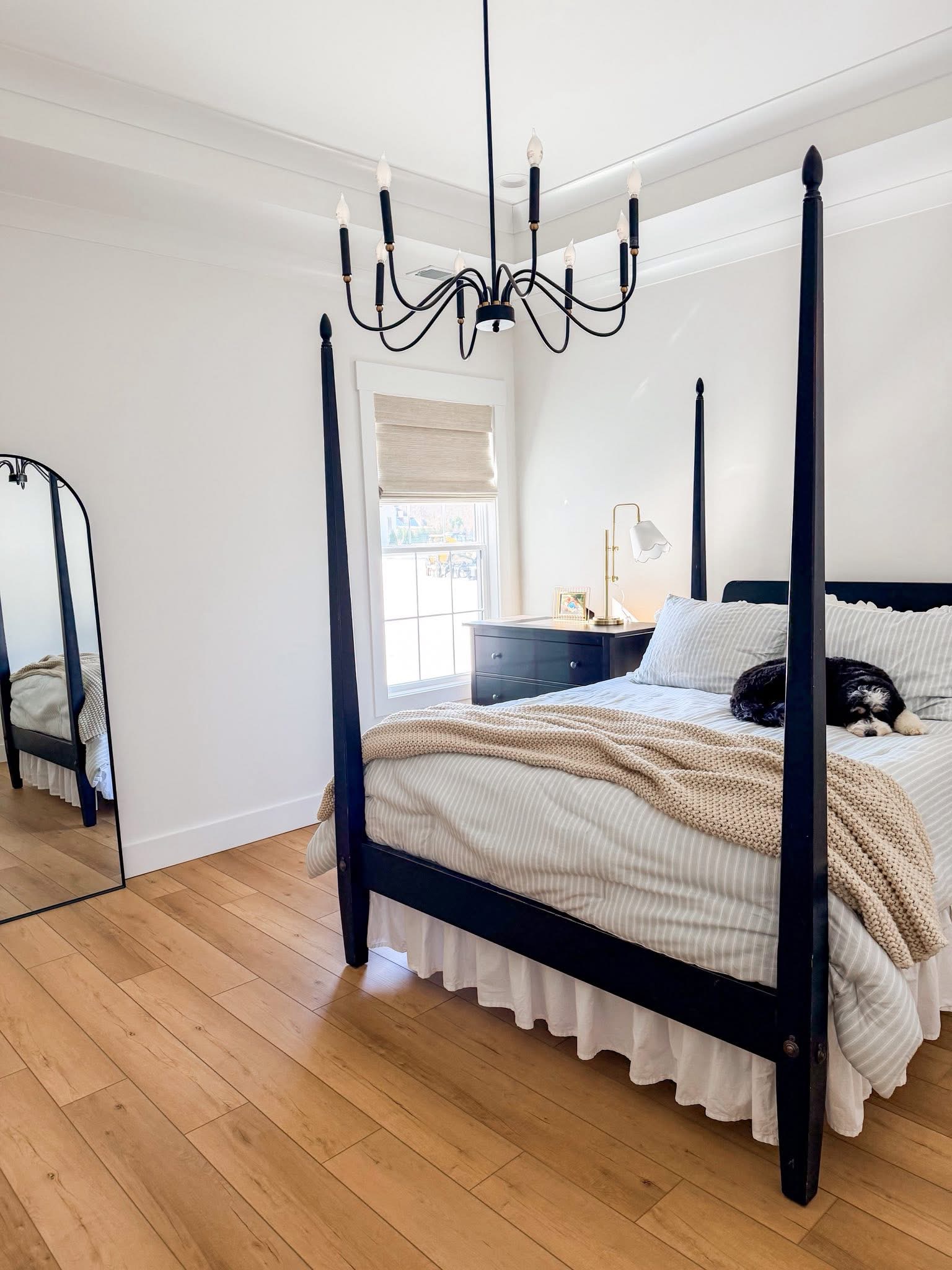 Roman shade in a bright bedroom